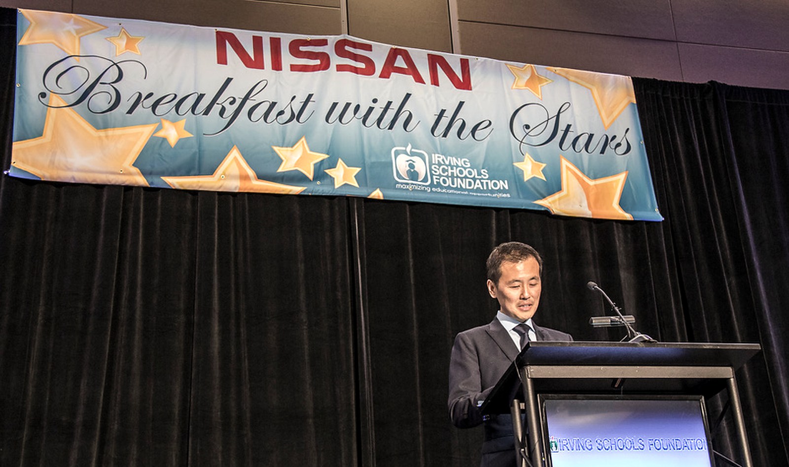 Sung Won, MD speaking at an Irving Schools Foundation scholarship ceremony