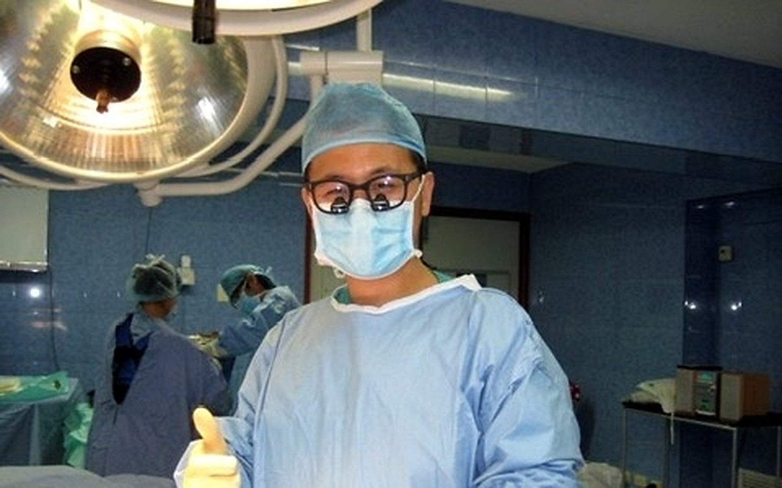 Sung Won, MD in an operating room during a medical mission in Peru